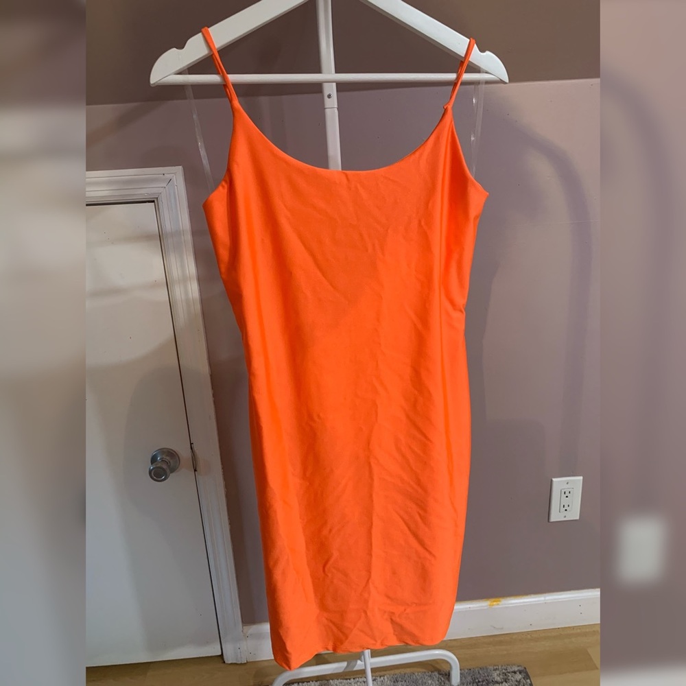 Neon orange bodycon dress